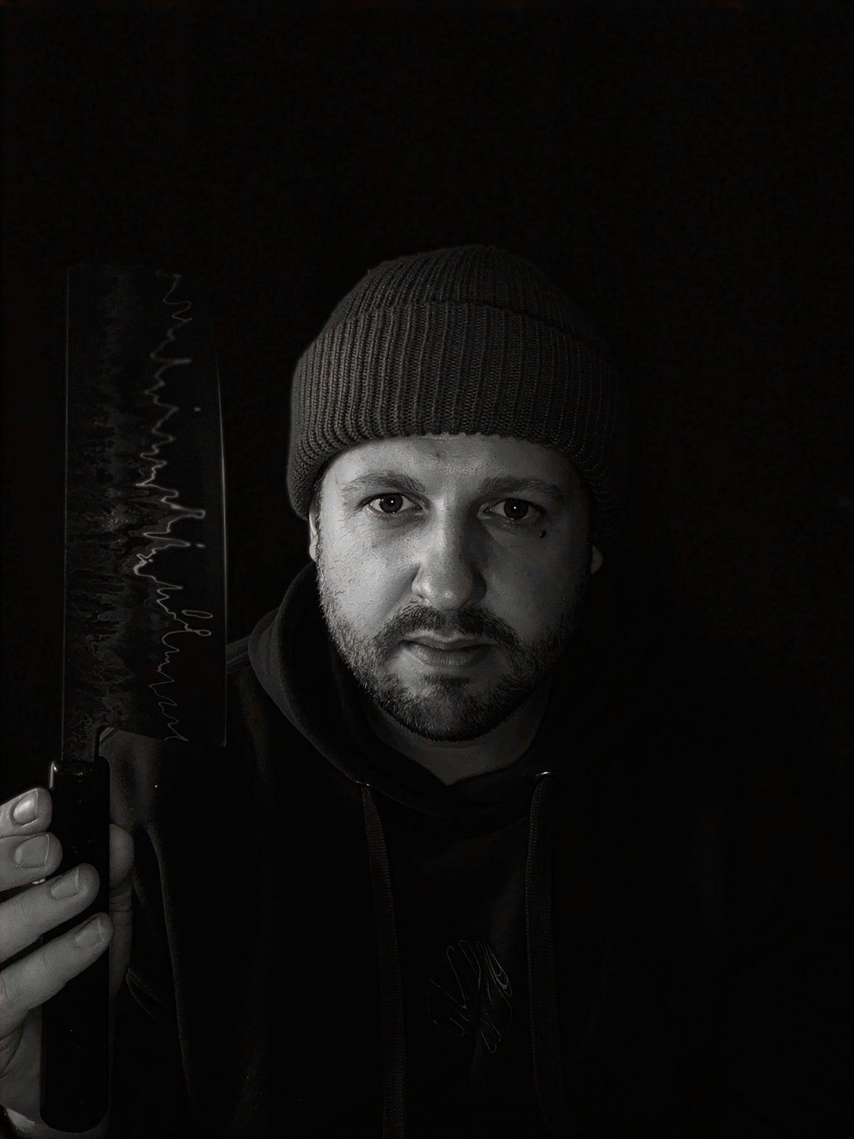 Martin Kaanbjerg holding one of his handmade kitchen knives